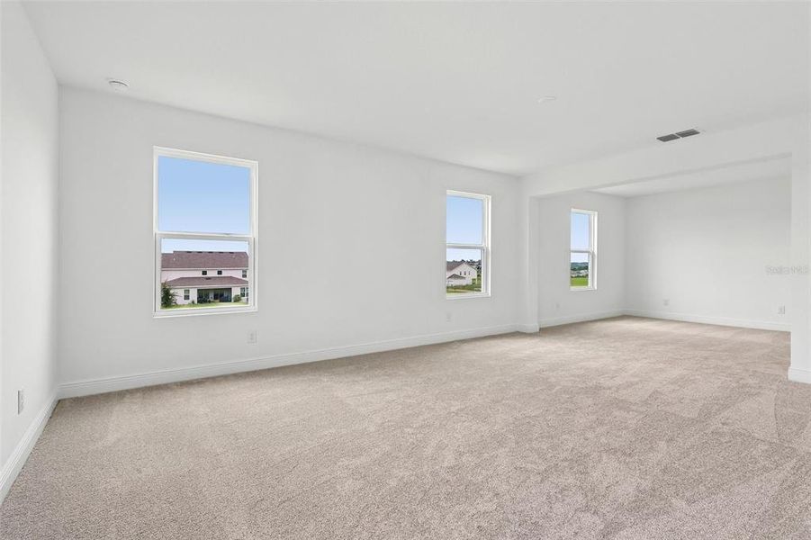 Spacious, unfurnished interior of a new home in Park View at the Hills, Minneola (Image 28).
