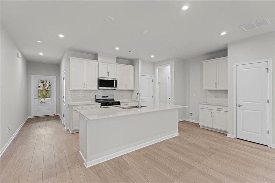 Furnished interior view inside a new home in Ansley Towns, Cumming (Image 5).
