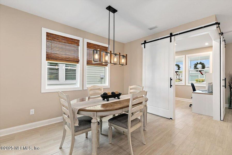 Furnished interior view inside a new home in RiverTown - WaterSong, St. Johns (Image 12).