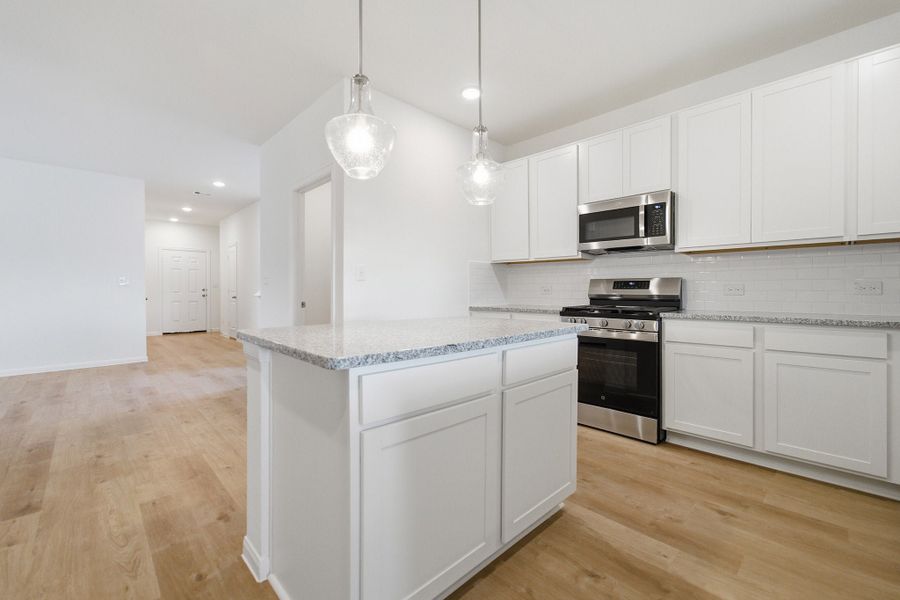 Furnished interior view inside a new home in Caney Mills, Conroe (Image 8).