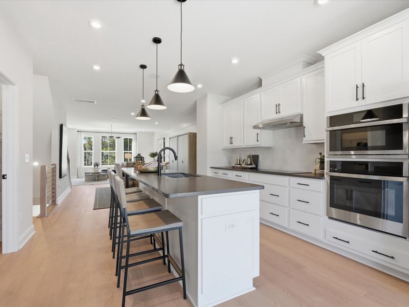 Representative furnished interior of a home built from the Dahlia by Tri Pointe Homes in Bellflower, Charlotte (Image 16).