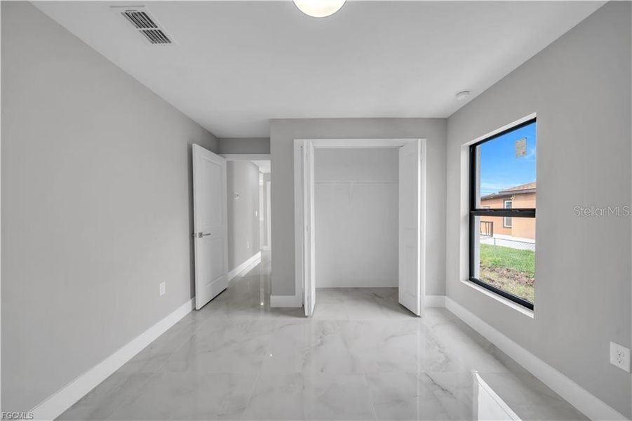 Spacious, unfurnished interior of a new home in , Lehigh Acres (Image 31). Spacious, unfurnished interior of a new home in , Lehigh Acres (Image 31).