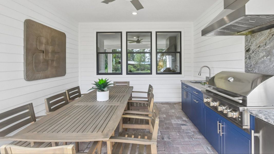 Outdoor Summer Kitchen and Sitting Area in the Marigold Floor Plan