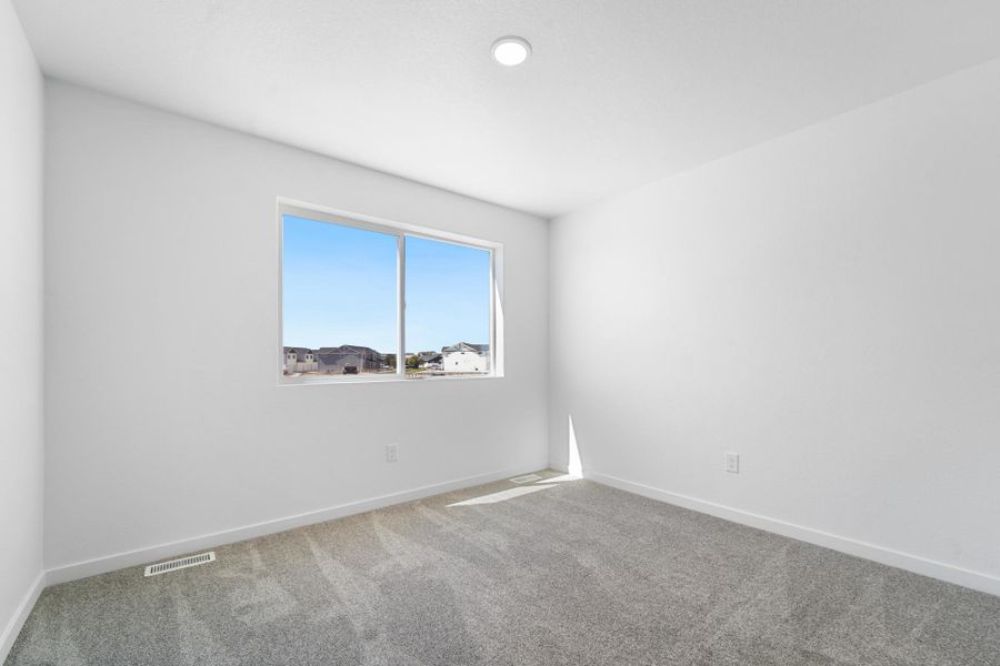 Spacious, unfurnished interior of a new home in Conestoga, Ault (Image 18).
