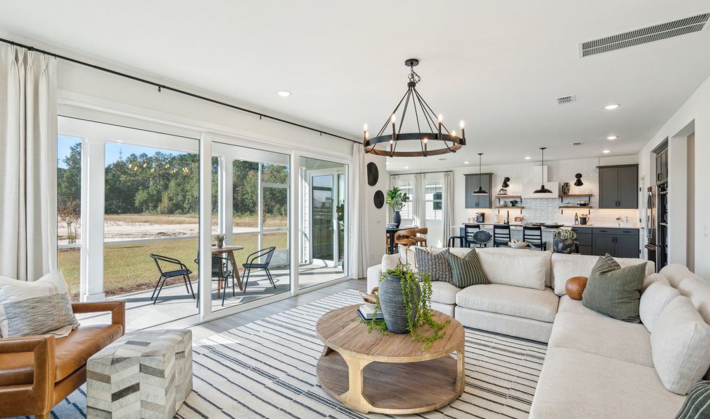 Great room with 15' multi-slide door to screened patio