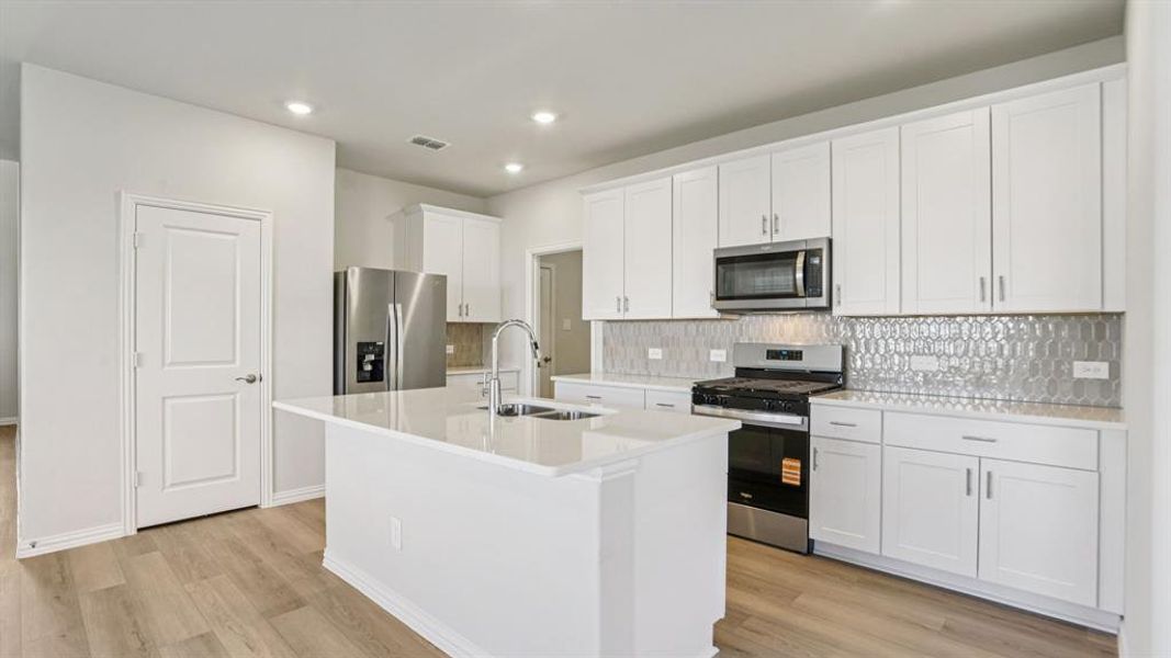 Furnished interior view inside a new home in Eastridge - Spring Series, McKinney (Image 8). Furnished interior view inside a new home in Eastridge - Spring Series, McKinney (Image 8).