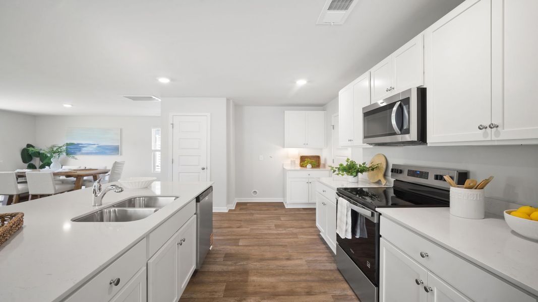 Furnished interior in a model home at The Lakes at North Glynn in Brunswick (Image 10).
