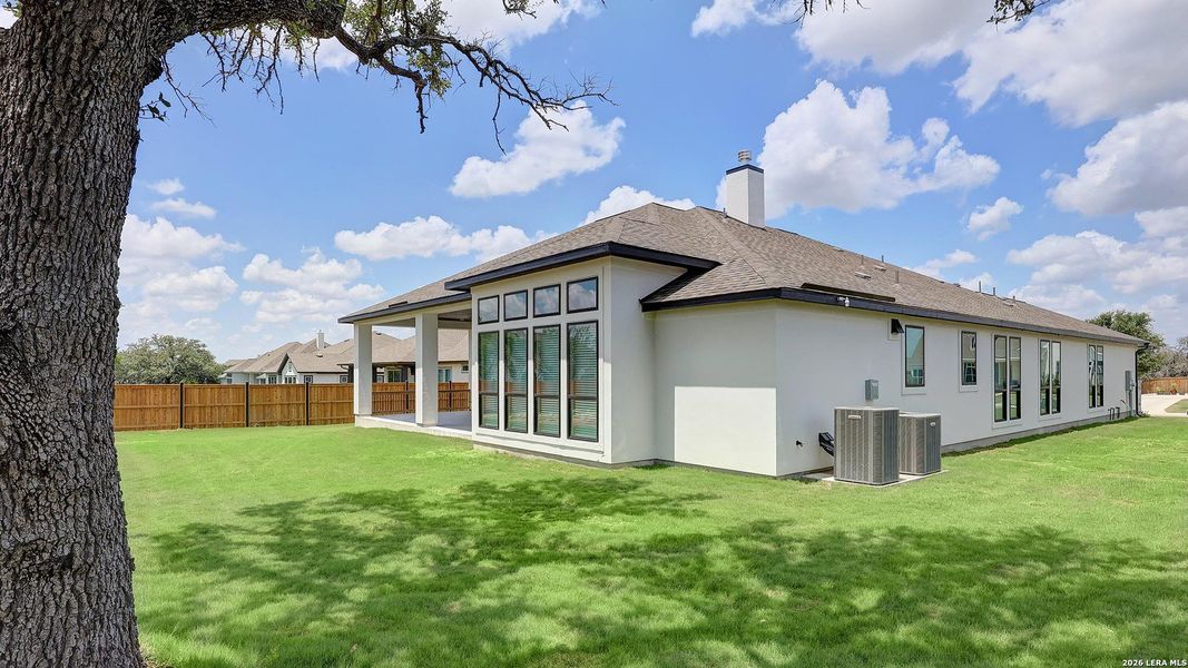 Exterior details and patio area of a home in Megan's Landing, Castroville (Image 26).