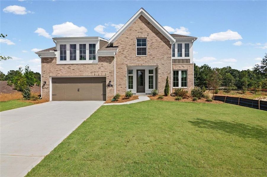 Front exterior of a new home in Woodberry, Canton, GA, highlighting curb appeal (Image 20).