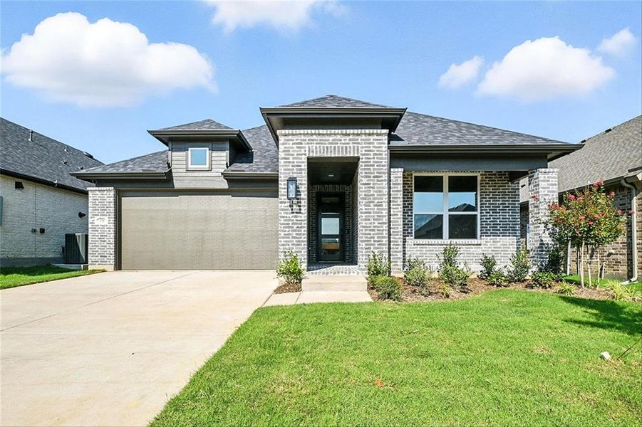 Front exterior of a new home in Heritage Ranch: 50ft. lots, Sherman, TX, highlighting curb appeal (Image 2). Front exterior of a new home in Heritage Ranch: 50ft. lots, Sherman, TX, highlighting curb appeal (Image 2).