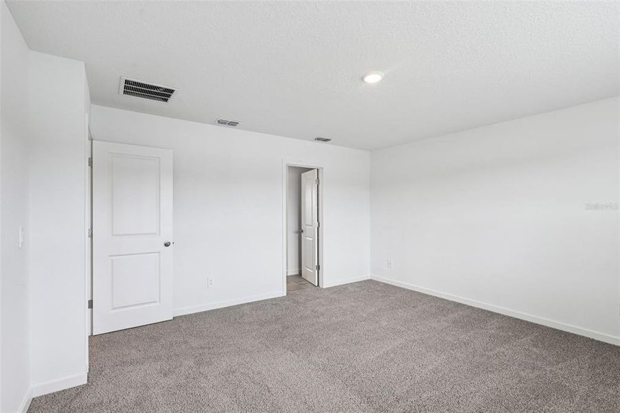 Spacious, unfurnished interior of a new home in Flagler Village - Signature Series, Palm Coast (Image 13). Spacious, unfurnished interior of a new home in Flagler Village - Signature Series, Palm Coast (Image 13).