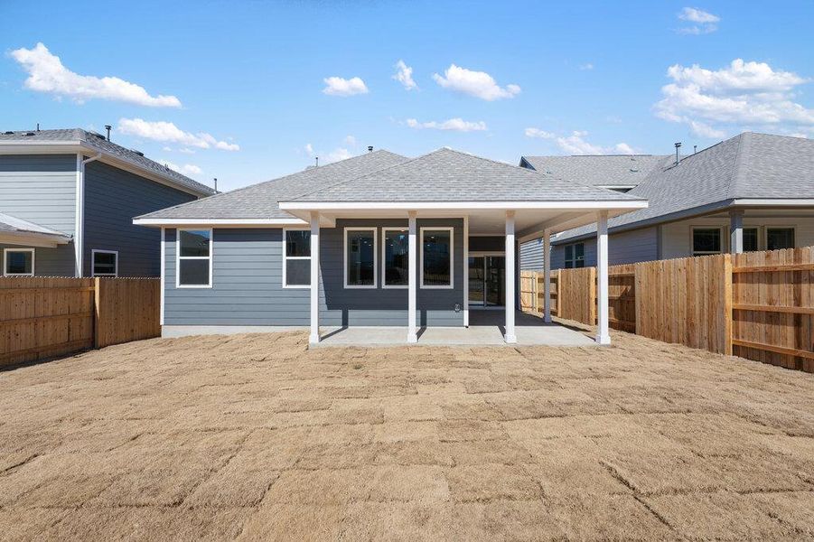 Exterior details and patio area of a home in Cannon Ranch, Dripping Springs (Image 4).