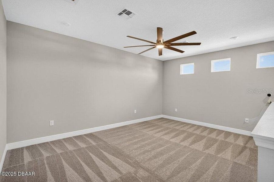 Spacious, unfurnished interior of a new home in Legends Preserve - Reserve Series, Daytona Beach (Image 40). Spacious, unfurnished interior of a new home in Legends Preserve - Reserve Series, Daytona Beach (Image 40).