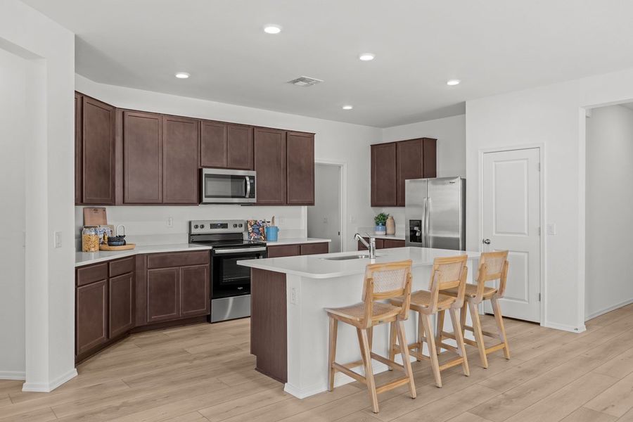Furnished interior view inside a new home in Skyline Village Enclaves, San Tan Valley (Image 3).