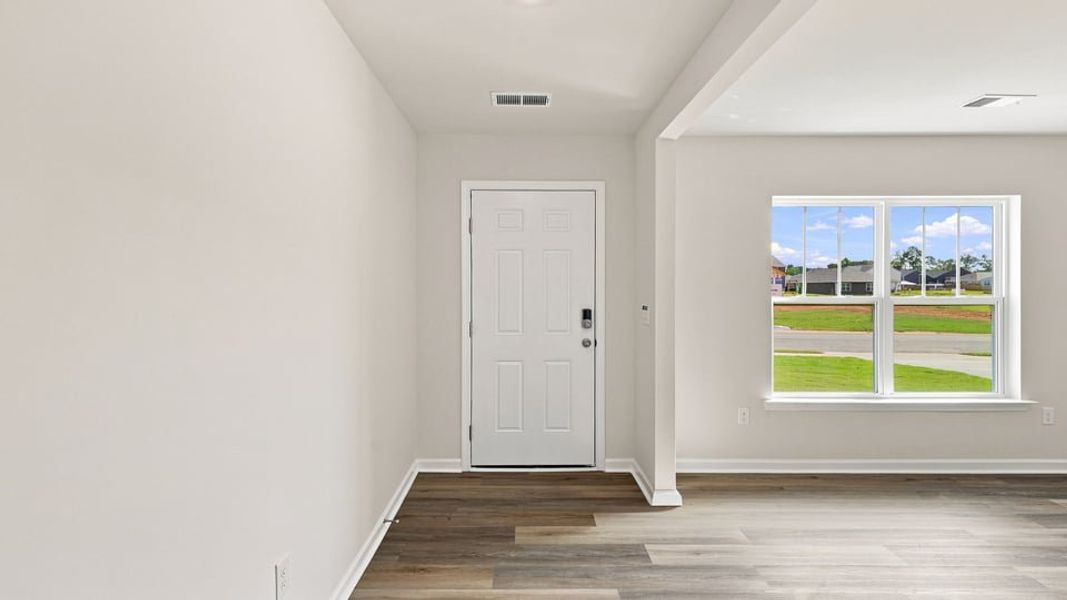 Spacious, unfurnished interior of a new home in Bentley Park, Greenwood (Image 16).