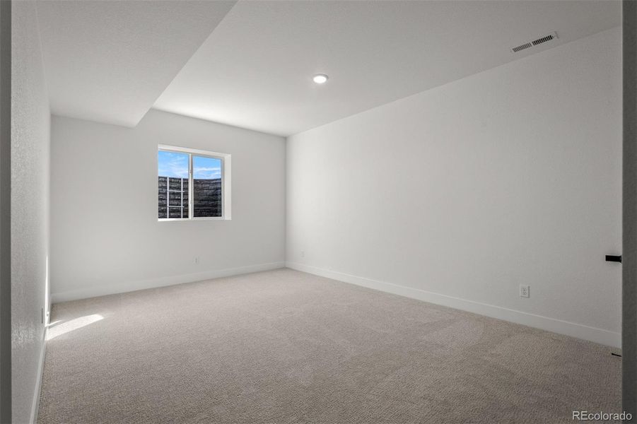 Spacious, unfurnished interior of a new home in Wolf Ranch - Enclave Collection, Colorado Springs (Image 27).