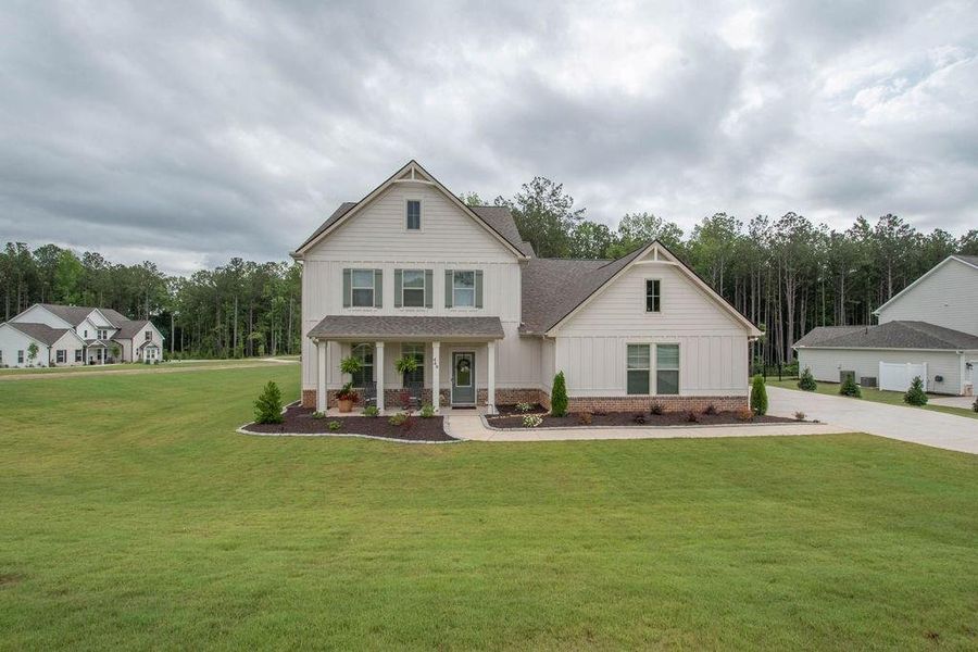 Front exterior of a new home in , Senoia, GA, highlighting curb appeal (Image 35). Front exterior of a new home in , Senoia, GA, highlighting curb appeal (Image 35).