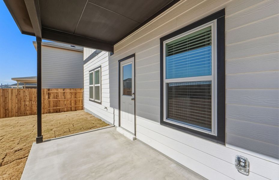 Exterior details and patio area of a home in Sunfield, Buda (Image 29).