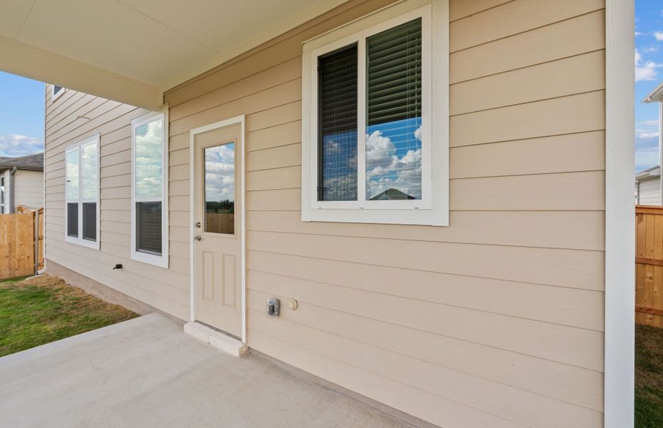 Exterior details and patio area of a home in Patterson Ranch, Georgetown (Image 24).