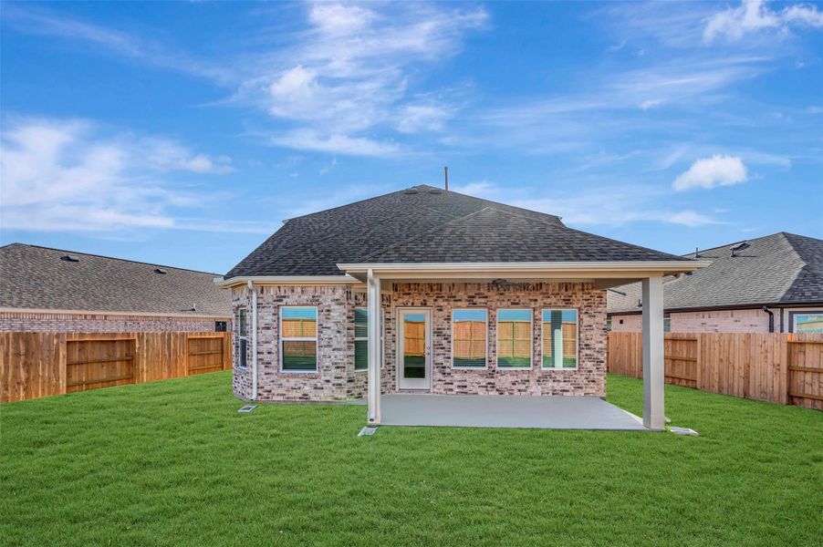 Exterior details and patio area of a home in Marvida, Cypress (Image 24).