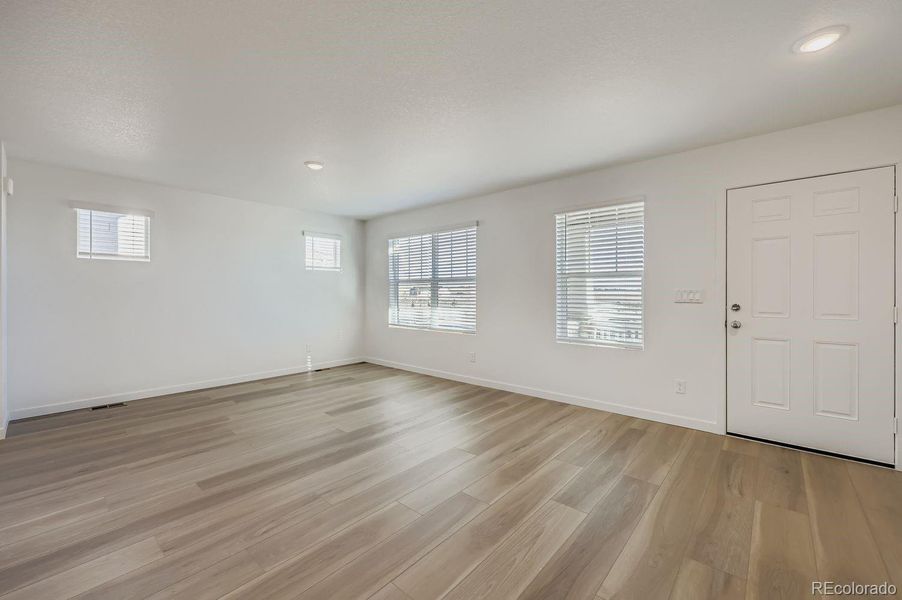 Spacious, unfurnished interior of a new home in Percheron: The Explorer Collection, Colorado Springs (Image 9).