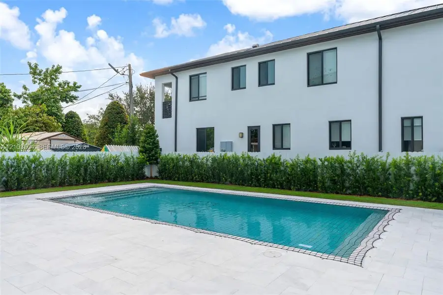Exterior details and patio area of a home in , Miami (Image 4).