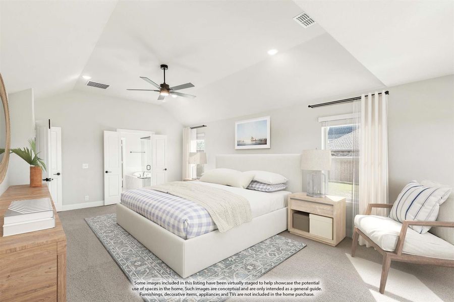 Spacious master bedroom with vaulted ceiling, ceiling fan, carpet flooring, and ensuite bathroom access Spacious master bedroom with vaulted ceiling, ceiling fan, carpet flooring, and ensuite bathroom access
