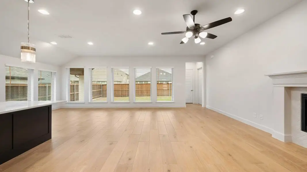 Representative unfurnished interior of a home built from the 2619W by Perry Homes in Revera, Rosenberg (Image 9).