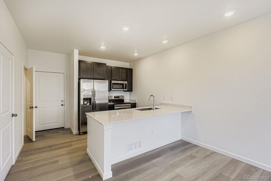 Furnished interior view inside a new home in Parterre, Thornton (Image 8).