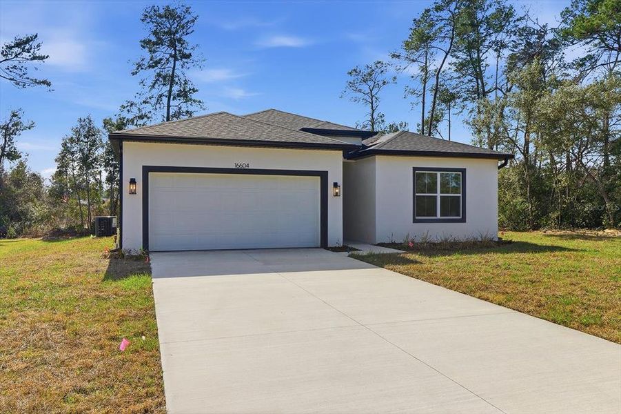 Front exterior of a new home in , Ocala, FL, highlighting curb appeal (Image 23).
