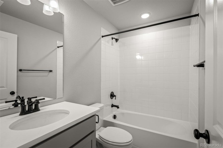 Furnished interior in a model home at Revel Crossing at Wolf Ranch – The Ascent Collection in Colorado Springs (Image 19).