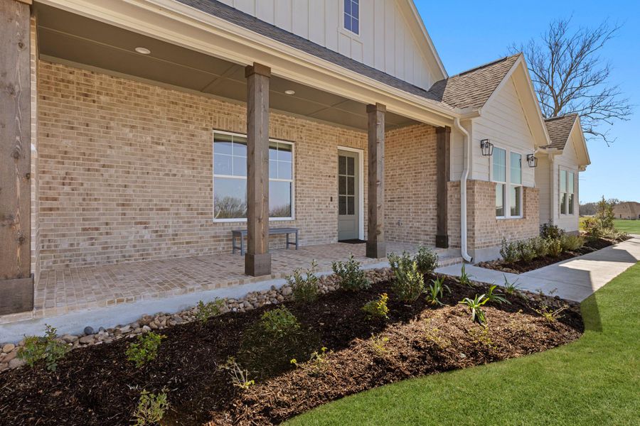Front exterior of a new home in , Smithville, TX, highlighting curb appeal (Image 19). Front exterior of a new home in , Smithville, TX, highlighting curb appeal (Image 19).