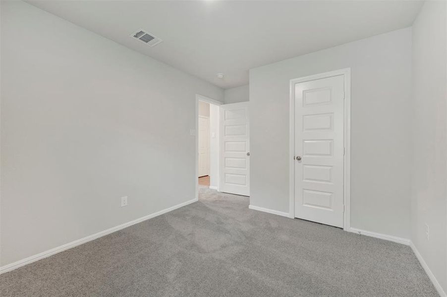 Spacious, unfurnished interior of a new home in Woodstone, Providence Village (Image 35).