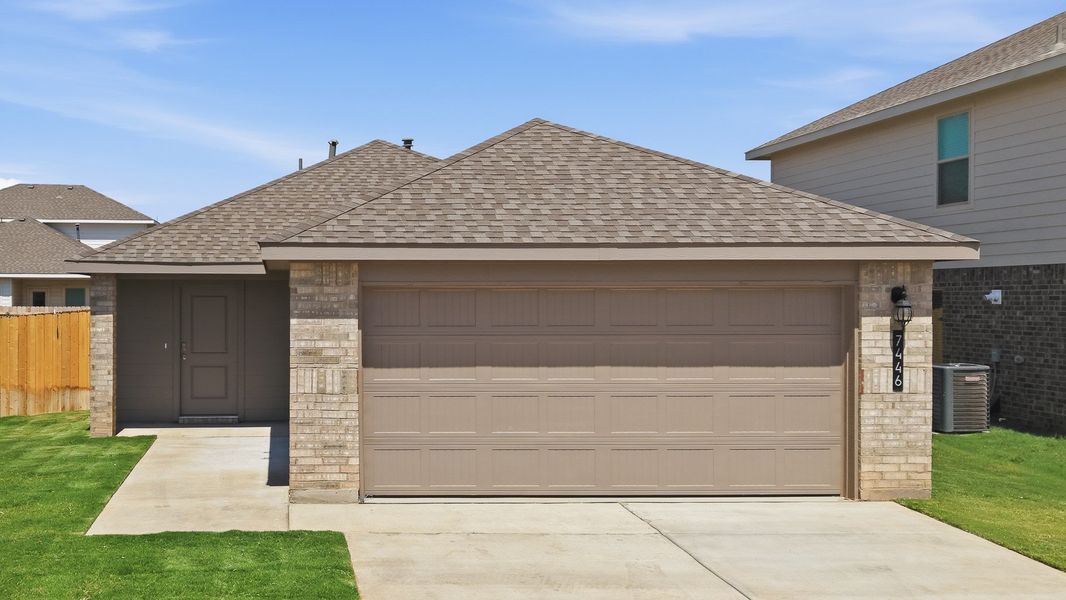 Front exterior of a new home in Terra Vista, Lubbock, TX, highlighting curb appeal (Image 1). Front exterior of a new home in Terra Vista, Lubbock, TX, highlighting curb appeal (Image 1).