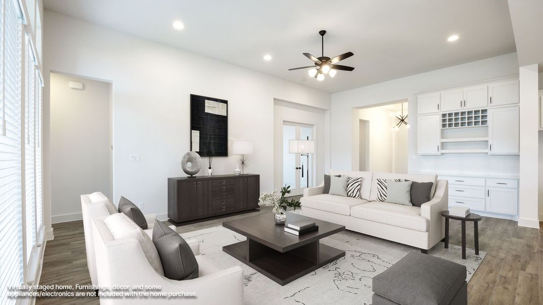 Furnished interior view inside a new home in The Colony, Bastrop (Image 6).