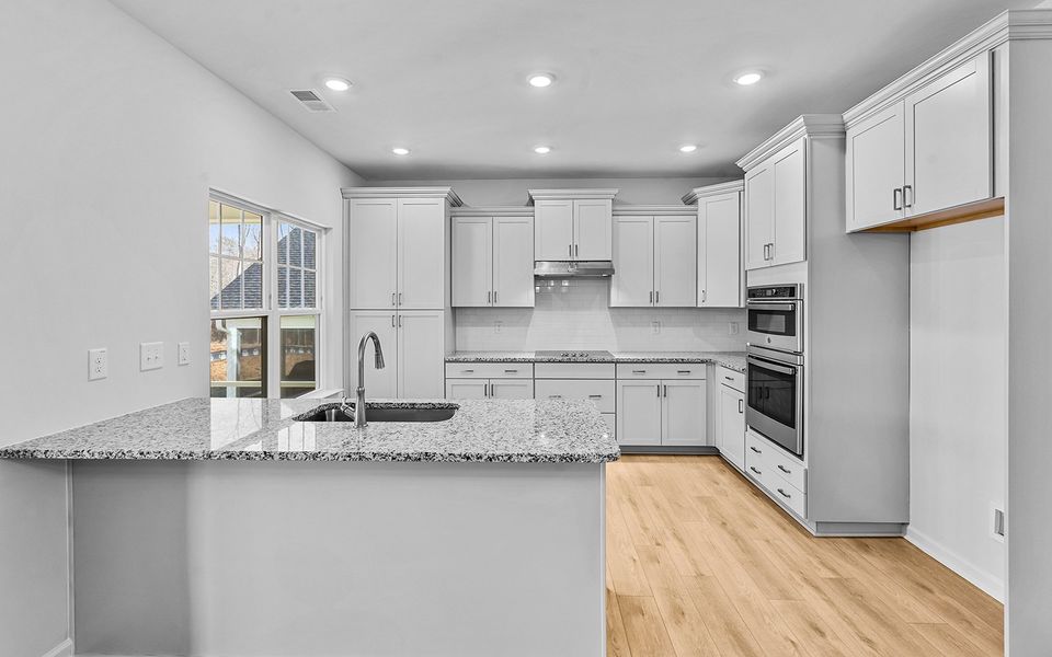 Furnished interior view inside a new home in Brayden, Advance (Image 7).