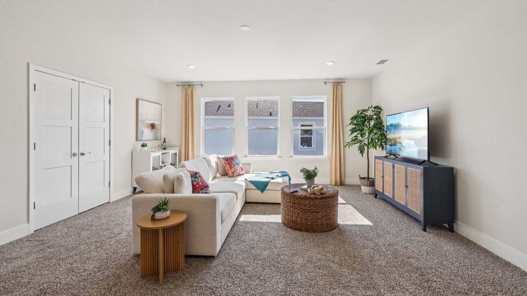 Representative furnished interior of a home built from the Holden by D.R. Horton in Tartan Farms at Winding Oaks, Ocala (Image 23).