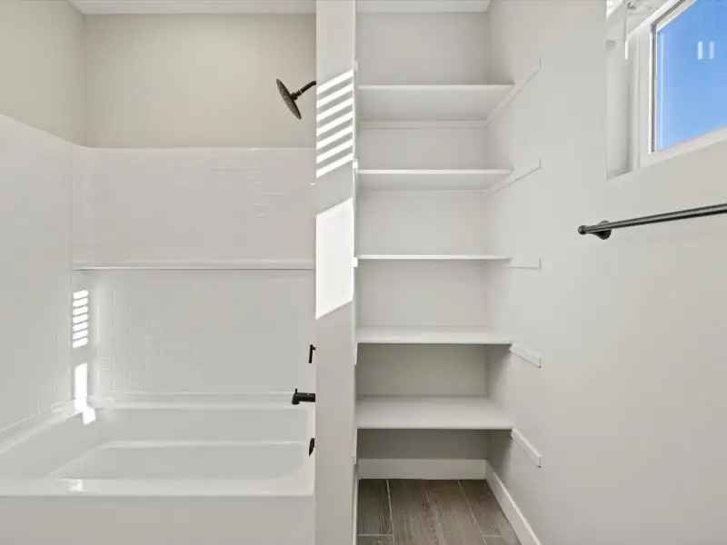 Spacious, unfurnished interior of a new home in White Tank Foothills Reserve Series, Waddell (Image 18). Spacious, unfurnished interior of a new home in White Tank Foothills Reserve Series, Waddell (Image 18).