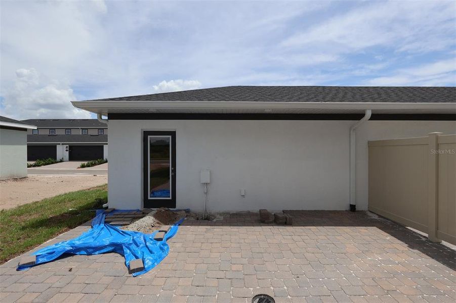 Exterior details and patio area of a home in Center Lake on the Park, St. Cloud (Image 4).