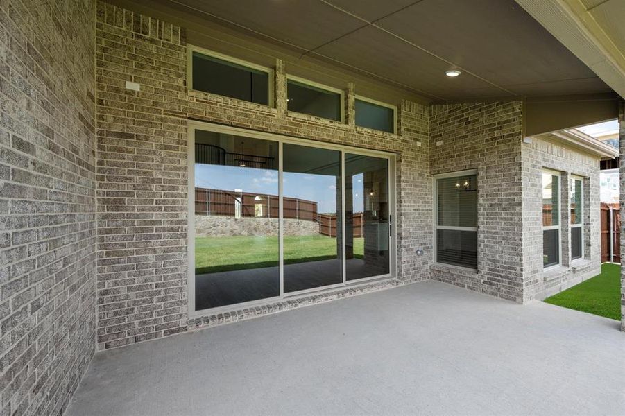 Exterior details and patio area of a home in Shady Valley Estates, Midlothian (Image 20).