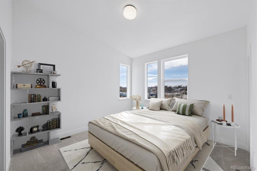 Primary bedroom on upper floor. Virtually Staged. Primary bedroom on upper floor. Virtually Staged.