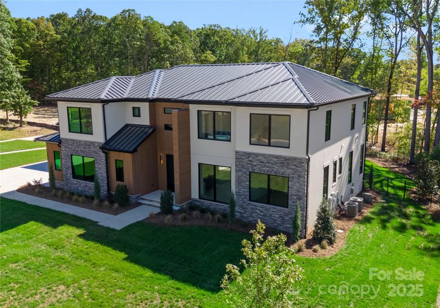 Front exterior of a new home in , Matthews, NC, highlighting curb appeal (Image 21).