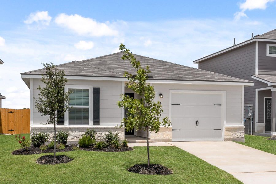 Front exterior of a new home in Sunset Oaks, Maxwell, TX, highlighting curb appeal (Image 11).