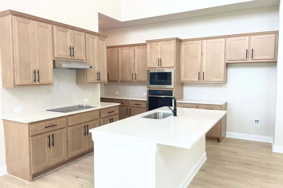 Furnished interior view inside a new home in Whisper Valley, Manor (Image 10).