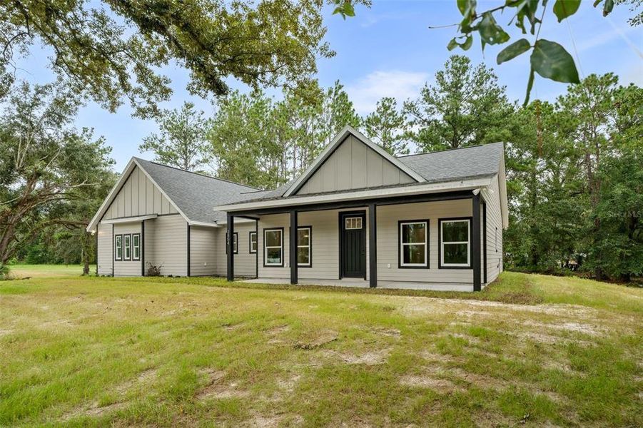 Front exterior of a new home in , Lake City, FL, highlighting curb appeal (Image 22).