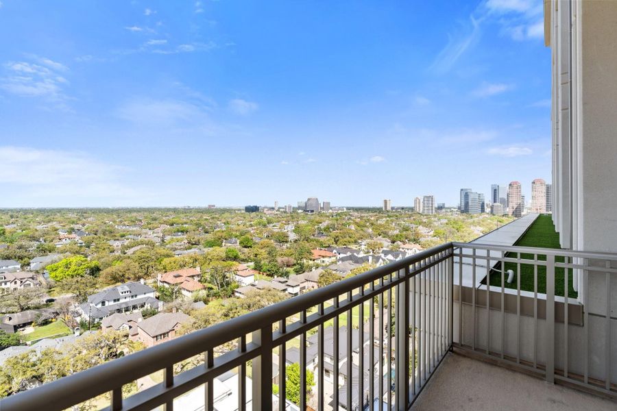 From the private balcony off the primary bedroom you can enjoy the vibrant city views From the private balcony off the primary bedroom you can enjoy the vibrant city views