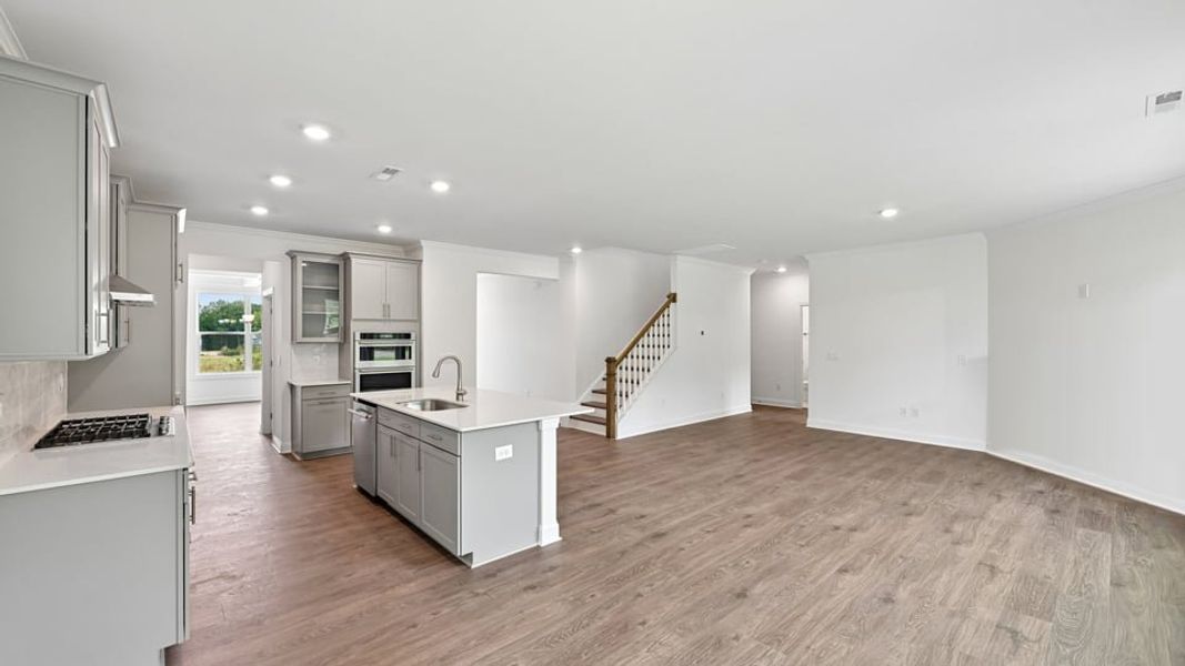 Furnished interior view inside a new home in The Estates Park, Apex (Image 6).