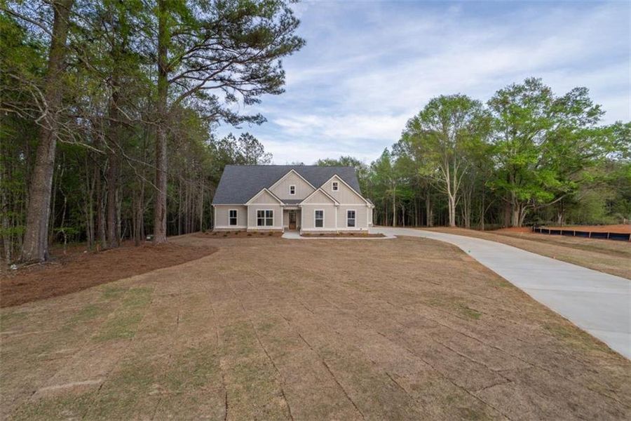 Front exterior of a new home in , Social Circle, GA, highlighting curb appeal (Image 23).