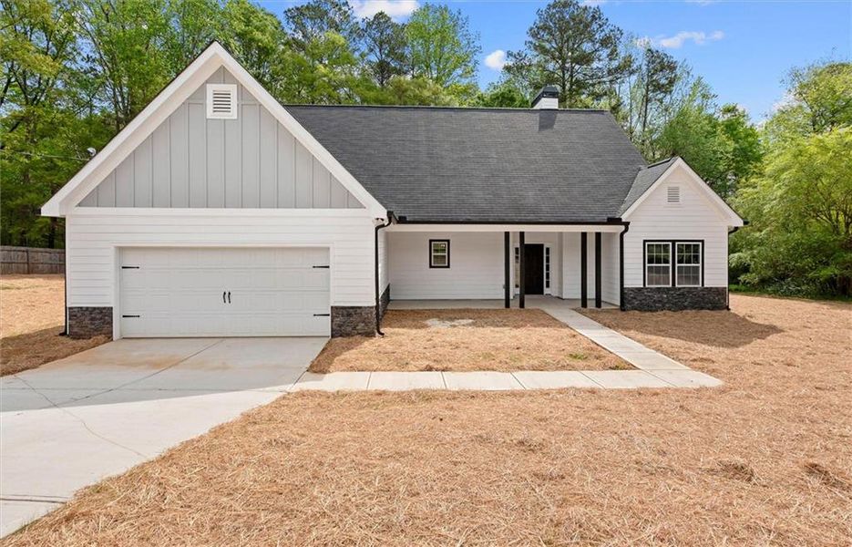 Front exterior of a new home in , Villa Rica, GA, highlighting curb appeal (Image 24).