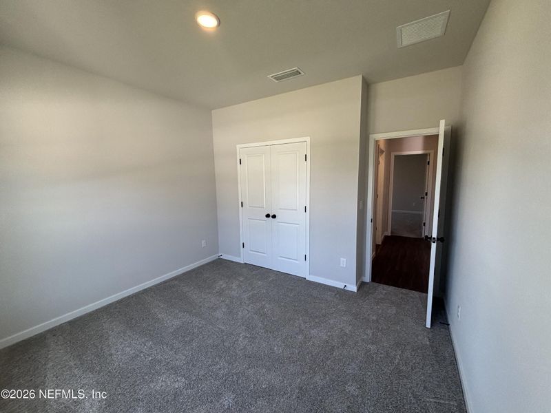 Spacious, unfurnished interior of a new home in Reserve East, Flagler Beach (Image 44).